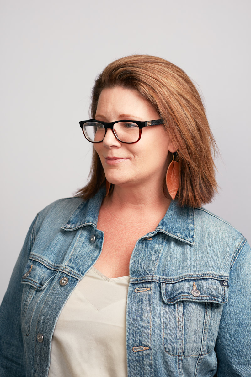 Creative, Editorial-Style Headshots of Woman in Glasses for Healthline NYC