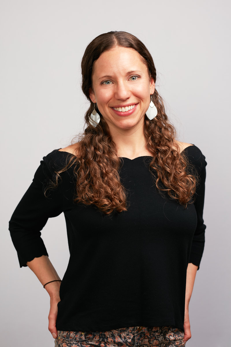 Creative, Editorial-Style Headshots of Woman with Ponytails for Healthline NYC