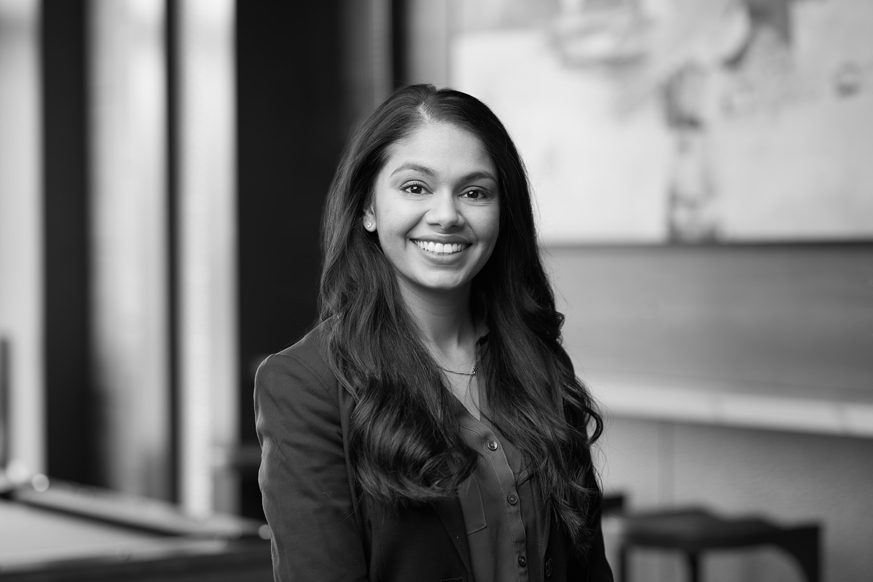Classic black and white headshot of female executive at major real estate developer Big