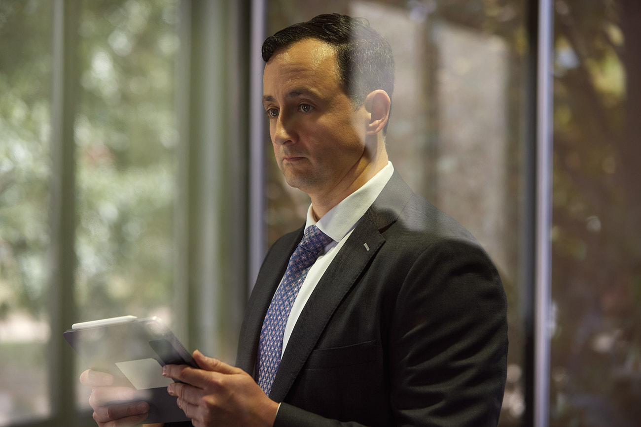 Office Lifestyle Photographer DFW - Corporate CEO Working on iPad in Office